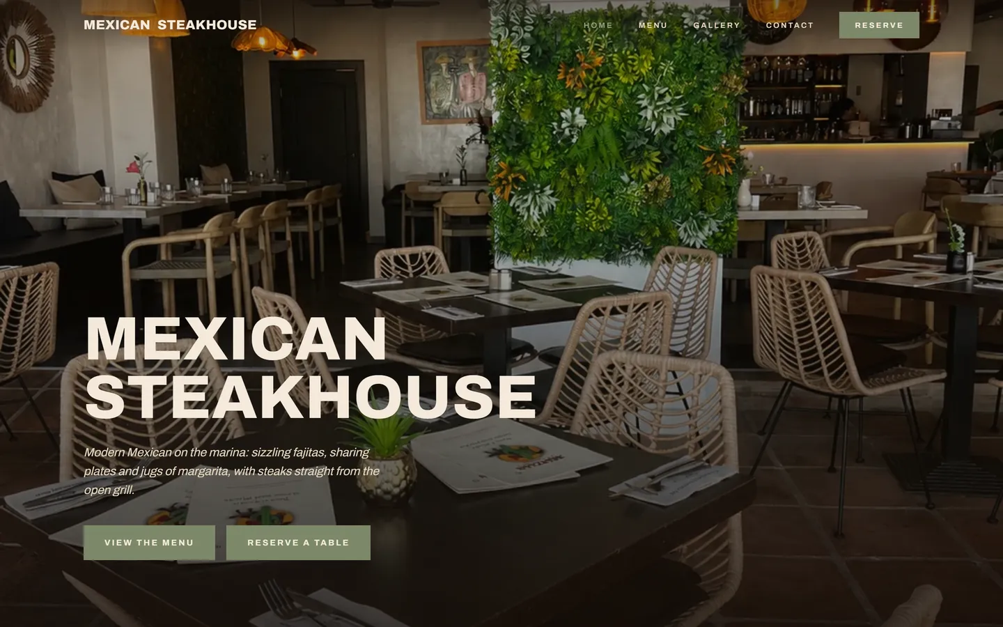 The Mexican Steakhouse website — bold condensed capitals and warm sage-green buttons over a terracotta dining room